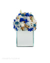 Blue Flowers in a Mirror Vase