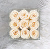 Box of 9 champagne roses that lasts a year.
